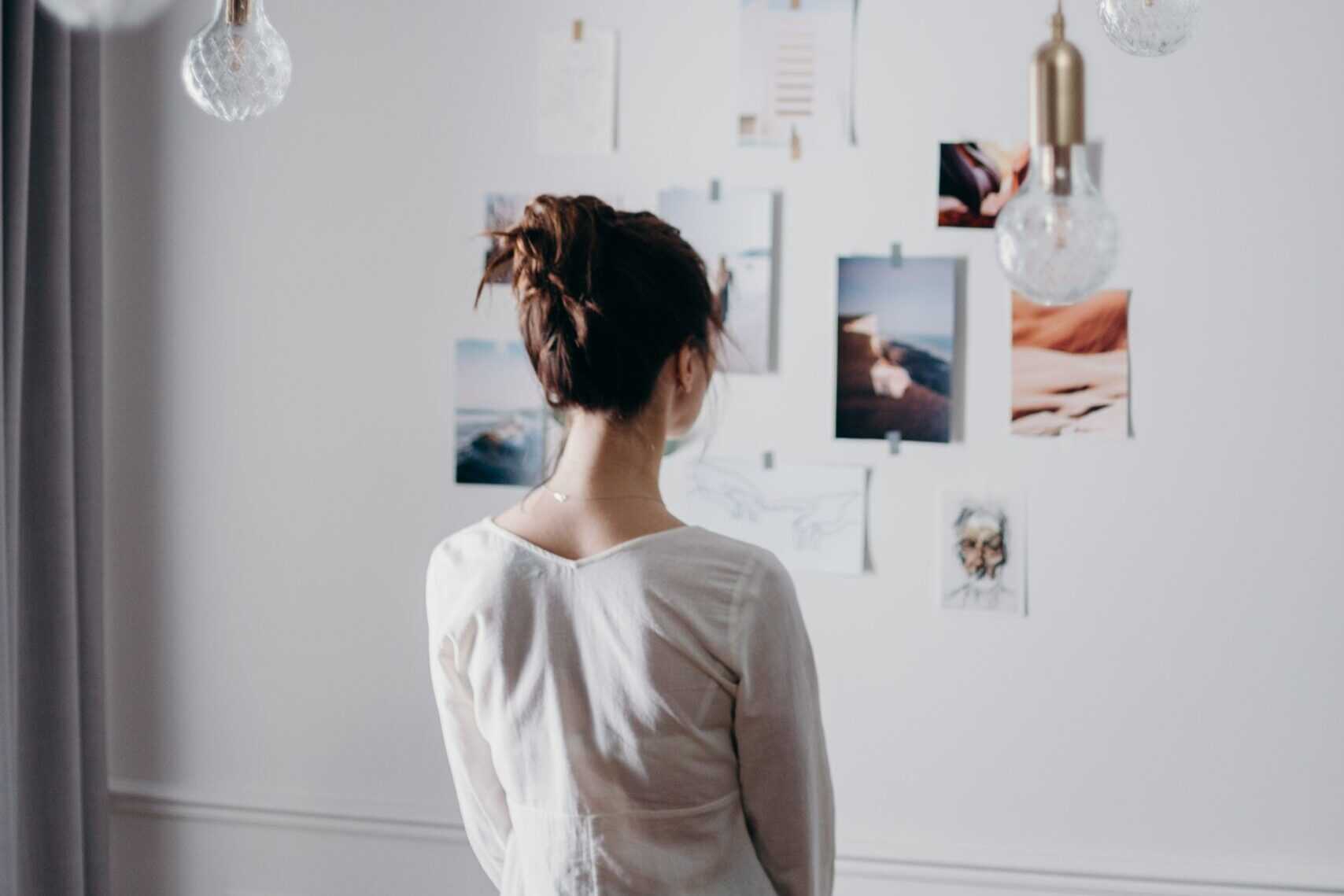 women looking at paintings